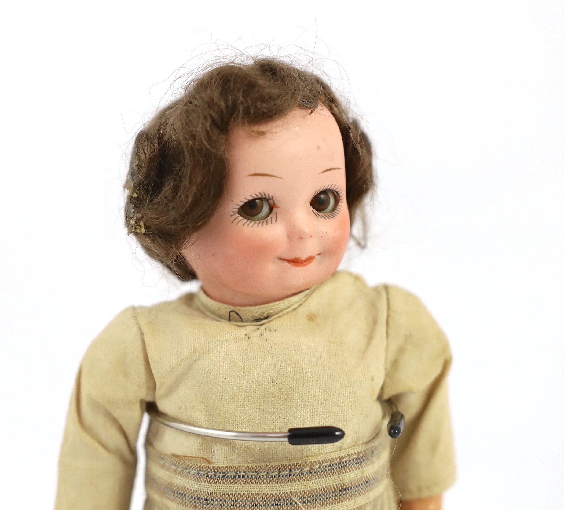 An Armand Marseille bisque character doll, German, circa 1925, 7.5in.